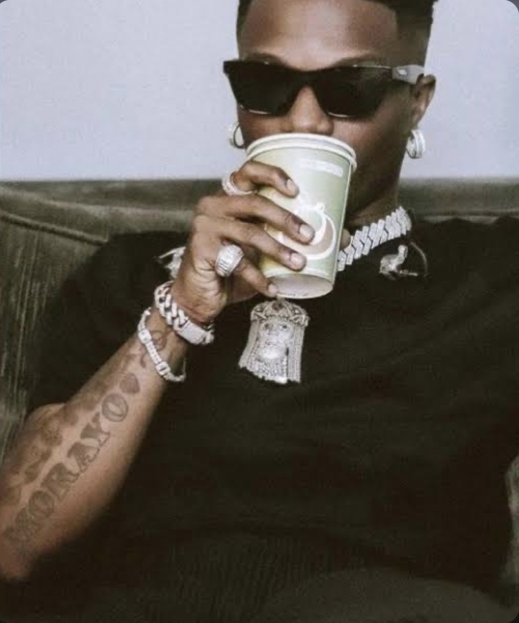 Wizkid mom’s name on his arm tattoo picture 